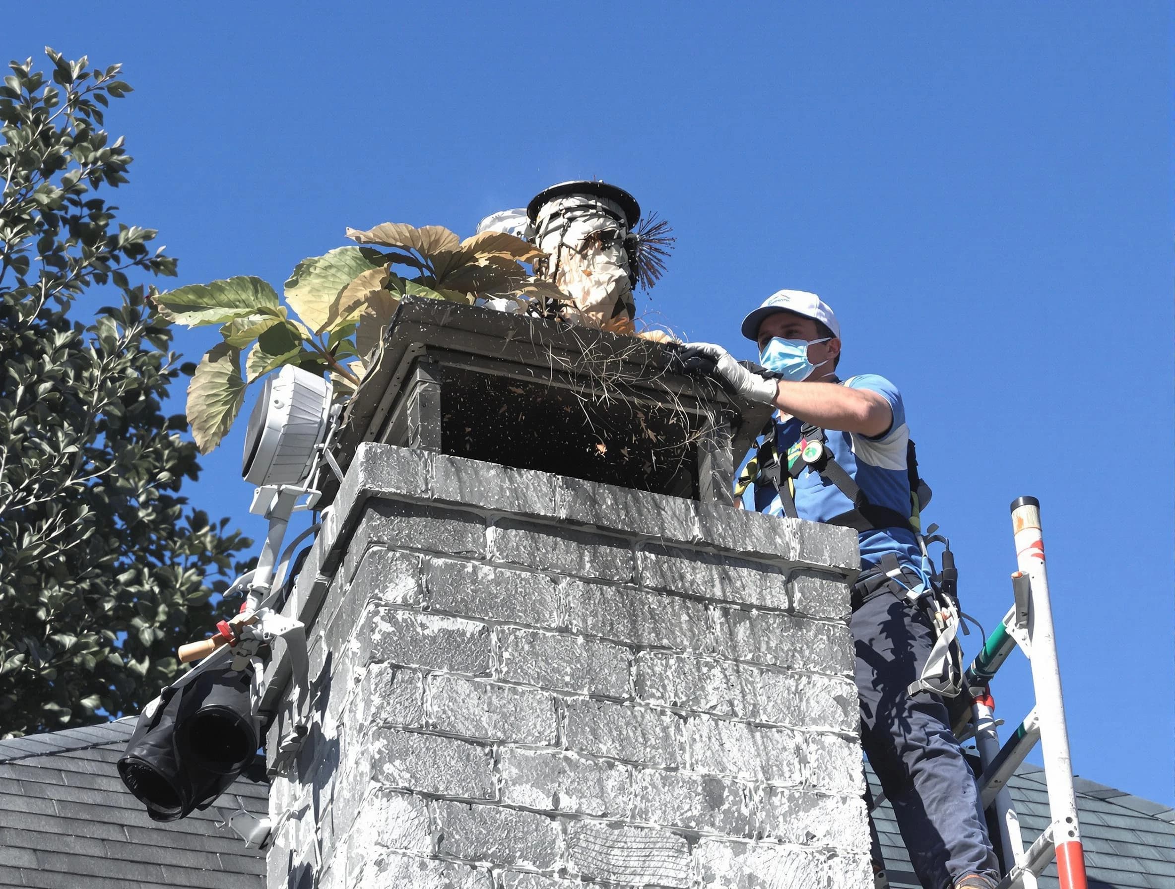 Sun City Chimney Sweep specialist performing chimney cleaning in Sun City, AZ